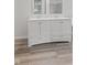 Modern bathroom with a double sink vanity, ample storage, and stylish finishes, creating a functional space at 7549 Stockard St, Indianapolis, IN 46239