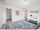 Bedroom featuring a crib, a patterned rug, and bright natural light at 7549 Stockard St, Indianapolis, IN 46239