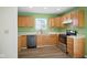 Well-equipped kitchen with stainless steel appliances and ample cabinetry for modern convenience at 7549 Stockard St, Indianapolis, IN 46239