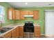 Functional kitchen with light wood cabinets and modern appliances, offering a practical cooking space at 7549 Stockard St, Indianapolis, IN 46239