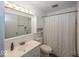 Inviting bathroom featuring a combined shower and tub, and vanity with ample storage for essentials at 7940 Benjamin Dr, Lawrence, IN 46226