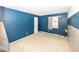 Well-lit bedroom with ample space and large window, perfect for creating a relaxing retreat at 7940 Benjamin Dr, Lawrence, IN 46226
