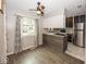 Kitchen with breakfast nook, modern appliances, ample counter space, and natural light at 7940 Benjamin Dr, Lawrence, IN 46226