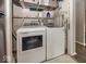 Convenient laundry area featuring a washer and dryer for easy clothes care at 7940 Benjamin Dr, Lawrence, IN 46226