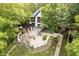 Gorgeous aerial shot of a home with an outdoor patio, pergola, and beautiful landscaping at 8301 Reef Ct, Indianapolis, IN 46236