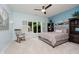 Bedroom with a window, rocking chair, neutral colored walls, and carpeted floor at 8301 Reef Ct, Indianapolis, IN 46236