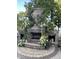 Outdoor fireplace decorated with flowers at 8301 Reef Ct, Indianapolis, IN 46236