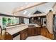 Spacious kitchen and dining area with granite countertops, stainless steel appliances, and gas cooktop at 8301 Reef Ct, Indianapolis, IN 46236