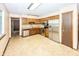 Traditional kitchen with stainless steel appliances, tile backsplash, and ample counter space at 9010 Deer Run Dr, Indianapolis, IN 46256