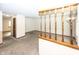 Open living room with neutral walls, plush carpeting and natural lighting at 9010 Deer Run Dr, Indianapolis, IN 46256
