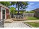Cozy backyard deck featuring a seating area and privacy fence, creating a relaxing outdoor space for gatherings at 941 N Beville Ave, Indianapolis, IN 46201
