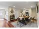 A traditionally decorated dining room features a wooden table with four chairs and a decorative rug at 941 N Beville Ave, Indianapolis, IN 46201