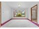Bedroom featuring large windows offering natural light and neutral carpet at 959 Harvest Ridge Dr, Avon, IN 46123