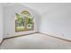 Bright bedroom with a large window and neutral carpet at 959 Harvest Ridge Dr, Avon, IN 46123