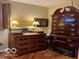 Bedroom offering ample storage with a dresser and tall chest of drawers at 9701 Hamilton Hills Ln, Fishers, IN 46038