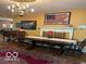 Elegant dining room featuring classic decor, hardwood floors, and ample natural light at 9701 Hamilton Hills Ln, Fishers, IN 46038
