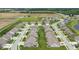 Aerial view of a neighborhood with houses neatly aligned and green spaces between them at 104 Perlican Dr, Cicero, IN 46034