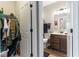 View of the bathroom with single vanity, toilet, and hanging towels at 104 Perlican Dr, Cicero, IN 46034