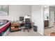 Bedroom featuring a work space with a desk, rolling chair and view of the ensuite bathroom at 104 Perlican Dr, Cicero, IN 46034