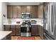 Modern kitchen featuring stainless steel appliances and plenty of counter space at 104 Perlican Dr, Cicero, IN 46034