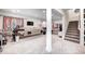 Open basement area featuring a sewing and crafts setup with carpeted floors at 10479 Dusty Rose Dr, Zionsville, IN 46077