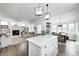 Open kitchen and living area, perfect for modern living and entertaining, featuring hardwood floors at 10479 Dusty Rose Dr, Zionsville, IN 46077