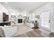 Bright living room with fireplace, built-in shelves, plush seating, and modern decor at 10479 Dusty Rose Dr, Zionsville, IN 46077