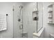Stylish glass shower with white subway tile and built-in niche at 10479 Dusty Rose Dr, Zionsville, IN 46077
