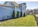 Side yard featuring newly landscaped shrubbery at 10479 Dusty Rose Dr, Zionsville, IN 46077