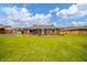 Charming brick ranch home with a well-maintained lawn and inviting front entrance at 105 Golf Club Rd, Anderson, IN 46011