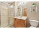 Bathroom with a vanity, walk-in shower, and updated fixtures at 1121 N Cambridge Ct, Greenfield, IN 46140