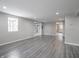 Bright basement featuring neutral walls, recessed lighting, and durable gray flooring at 1141 Temperance Ave, Indianapolis, IN 46203