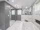 Bathroom featuring a glass-enclosed shower, soaking tub, and large vanity mirror at 1141 Temperance Ave, Indianapolis, IN 46203