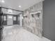 Neutral living area with tile flooring throughout at 1141 Temperance Ave, Indianapolis, IN 46203