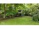 Backyard with a treehouse and playground area at 11956 Glen Cove Dr, Indianapolis, IN 46236