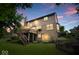 Exterior back of house showing the deck, outdoor lighting, and landscaping at 11956 Glen Cove Dr, Indianapolis, IN 46236