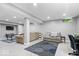 Finished basement with neutral walls, carpet, couches, TV, and a support beam at 11956 Glen Cove Dr, Indianapolis, IN 46236
