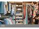 Organized walk-in closet featuring hanging rods, shelving, and drawers to provide lots of clothing storage at 11956 Glen Cove Dr, Indianapolis, IN 46236
