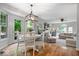 Bright living room with hardwood floors and a cozy seating area, perfect for entertaining at 11956 Glen Cove Dr, Indianapolis, IN 46236