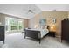 Cozy main bedroom with vaulted ceilings and a bay window providing ample natural light at 11956 Glen Cove Dr, Indianapolis, IN 46236