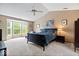 A spacious bedroom with vaulted ceilings and a bay window letting in natural light at 11956 Glen Cove Dr, Indianapolis, IN 46236