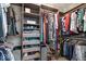 Organized walk-in closet boasts custom shelving, hanging rods, and ample storage for clothes and shoes at 11956 Glen Cove Dr, Indianapolis, IN 46236