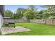 Spacious, grassy fenced backyard offers plenty of room for outdoor activities at 12277 E Harvest Glen Dr, Indianapolis, IN 46229