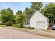 Charming house with a garage and well-maintained landscape, complemented by mature trees and a welcoming curb appeal at 126 N Darlington St, Jamestown, IN 46147