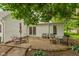 Charming brick patio with outdoor seating, ideal for al fresco dining and enjoying the surrounding landscape at 126 N Darlington St, Jamestown, IN 46147