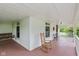 Cozy porch with a rocking chair, offering a relaxing space to enjoy the outdoor view at 126 N Darlington St, Jamestown, IN 46147
