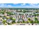 Aerial view showcasing a neighborhood with manicured lawns and diverse architecture at 12999 Deerstyne Green St, Carmel, IN 46032