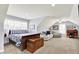 Comfortable bonus room with natural light, flexible seating area and bed space at 12999 Deerstyne Green St, Carmel, IN 46032