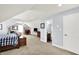 Expansive bonus room offers flexible living space, seating area and room for bed at 12999 Deerstyne Green St, Carmel, IN 46032