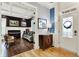 Spacious foyer with hardwood flooring, complemented by classic trim and views into adjacent living spaces at 12999 Deerstyne Green St, Carmel, IN 46032